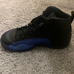 Blue and black Jordan 12s